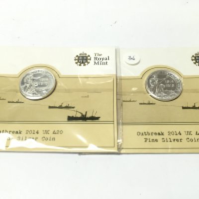 Two silver royal mint 2014 20 pound coins. Postage A