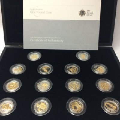 A royal mint 25th anniversary silver proof &pound;1 coin collection with COA. Postage B