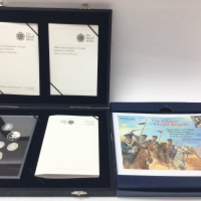 2008 silver proof emblems of Britain set and a 150th anniversary of the Crimean war silver coin cover. Also royal mint commemorative coins Postage B