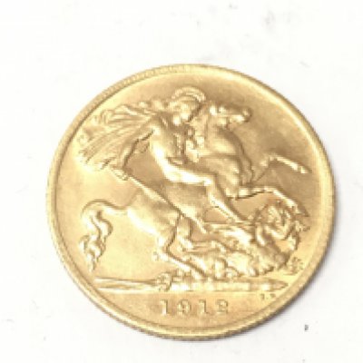 A 1912 half sovereign. Postage A