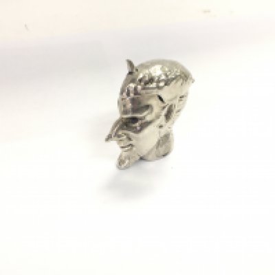 A silver Vesta in the form of lucifers head. Approx 31.85 grams.