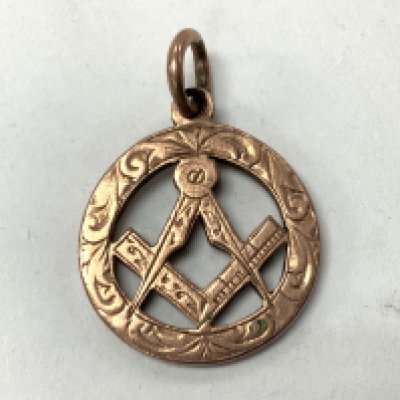 A 9ct gold Masonic charm. 4.8g, Postage category A.