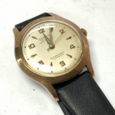 Gent midi size Geneva wristwatch. Postage category A.