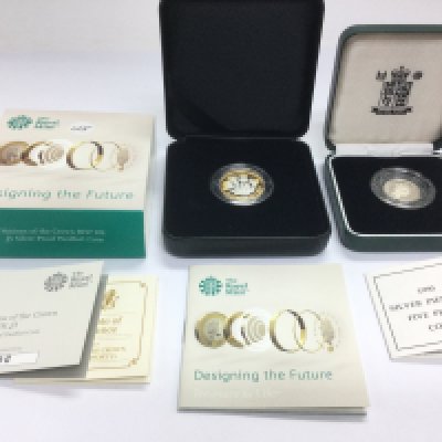 Two cased silver proof coins comprising a 2017 &pound;1 and a 1990 5p coin (2). Shipping category A.