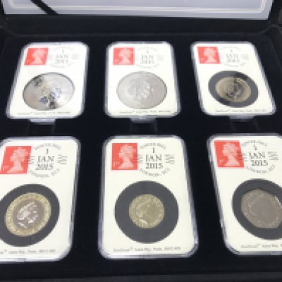 A 2015 date stamp United Kingdom specimen year set in wooden case.