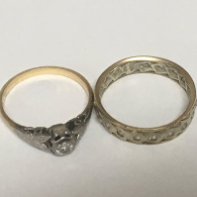 An 18carat gold ring set with a small diamond weight 2g and a gold eternity ring weight 2g. (2)