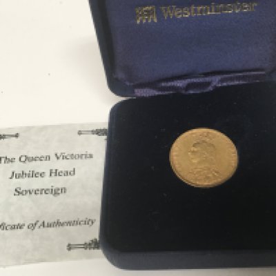 A Victorian 1889 gold Sovereign in a Westminster mint box with certificate.