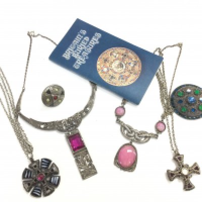 Celtic design jewellery including necklaces, brooch, ring and a vintage Britains Buried Treasures guide. Postage category A