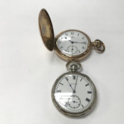An omega gold plated pocket watch seen running and a Elgin silver cased pocket watch not seen running.