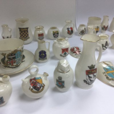 A collection of 45 items of WH Goss ware with various crests and model shapes .