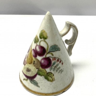 A small possibly Chelsea porcelain candle snuff with hand painted fruit decoration. (Some restoration) 6.5cm.