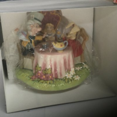 A Royal Doulton boxed as new Disney Showcase figure group The Mad Hatters Tea Party. limited edition 140/1000. With COA.