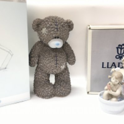 A boxed Lladro figure (some damage) and a boxed limited edition Me To You Standing Tall Carte Blanche bear resin figure. 18 and 30cm tall.