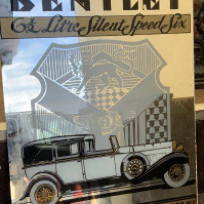 A modern unframed Bentley motors mirror. NO RESERVE