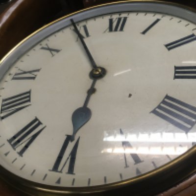 A mahogany drop dial wall clock the painted dial with Roman numerals 29 cm .