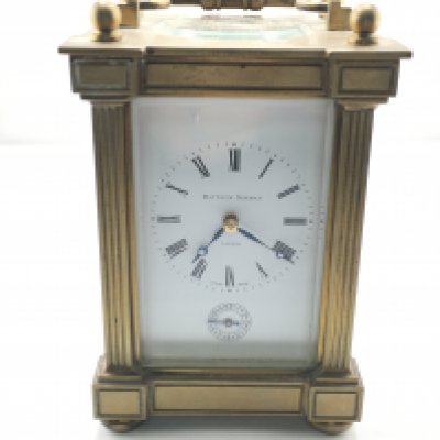 A Matthew Norman large carriage clock. Approximately 16cm tall by 10cm wide.
