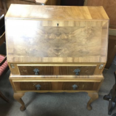 A walnut bureau (45x72x104cm) with three Arts and Crafts chairs. NO RESERVE