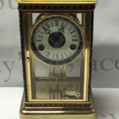 A good quality brass and cloisonnÃƒÂ© 4 glass clock with mercury pendulum, 29.5cm x 17.5cm x 13.5cm. (D, postage no offered for this lot).