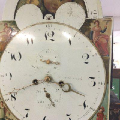 A mahogany long case clock the painted dial with moon roller Arabic numerals and second sub dial .