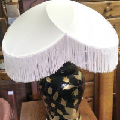 A modern mid 20th century black and gold leaf design lamp. 70cm tall. This lot cannot be posted