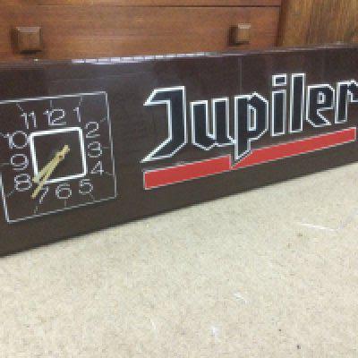 A Advertising wall rectangular wall clock Jupiiler . 30 cm x 100 cm .