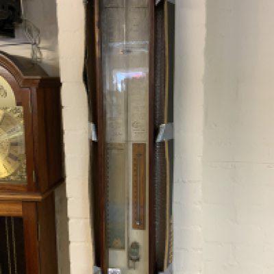 6An antique Admiral Fitzroy barometer.