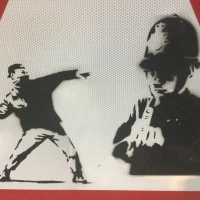 A 'Love is in the air' & 'F*** the police' Banksy Road sign - provenance: found in a deceased estate in Mile End (authentication please contact pest control)