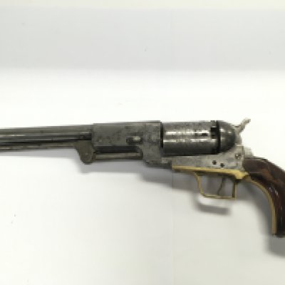 A rare antique percussion cap Sam Colt revolver with some possible later alterations. The engraved cylinder stamped Company No19. Please note that buyers must satisfy themselves as to the authenticity of this item before bidding. Shipping category D.