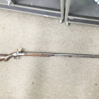 An antique muzzle load single barrel percussion rifle sporting gun with octagonal barrel. Shipping category D.