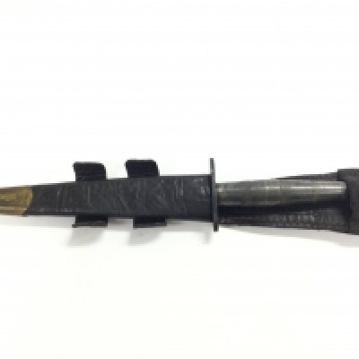 A Fairbairn Sykes style fighting knife with scabbard. 29.5cm long. This lot cannot be posted