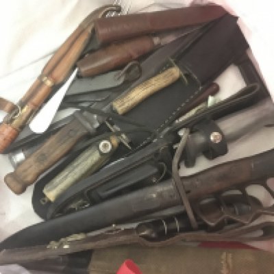A collection of knives, some being WW2 including bayonets, daggers and a knuckle knife. This lot cannot be posted