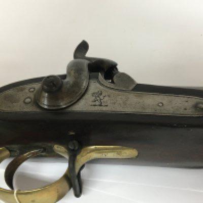 An East India Company Percussion Musket with a steel action and steel round barrel brass fittings and full length stock possibly a pattern F early 19th century.