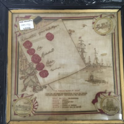 A framed post I world war handkerchief to mark the signatures of representatives of the six nations giving Belgium independence.