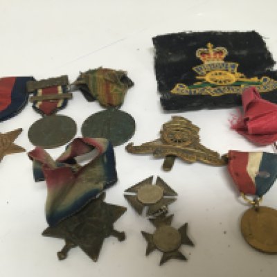 WITHDRAWN - A collection of medals including a I world war medal awarded to 23790 Pte J W Lowe R W Fus. One other First World War medal unreadable edge a 1939-49 star and other jubilee medals and military badges.