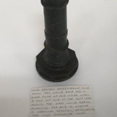 A German Third Reich Kriegsmarine mine horn with written card of explanation.