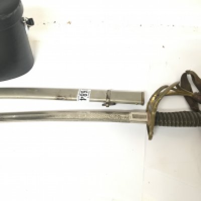 A Continental 19th century Cavalry sword with an etched blade and metal scabbard and a pair of binoculars.