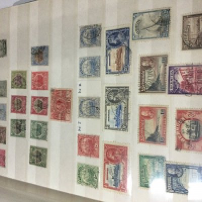 Seven albums of world stamps including first day covers.