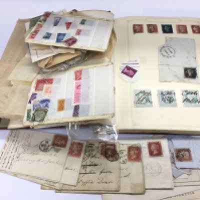 A small collection of stamps including a penny black, a penny blue and reds. Shipping category B.