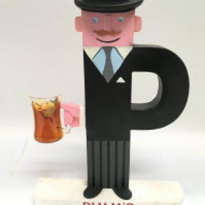 A vintage painted wooden Pimm's advertising figure, approx height 28cm. Shipping category B.