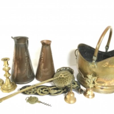 A collection of copper jugs, a coal bucket and other brass items. This lot cannot be posted. NO RESERVE