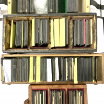 4 boxes of vintage glass slides. NO RESERVE