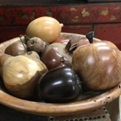 A treen bowl with wooden carved simulated fruit , 25cm wide approx. Postage category B