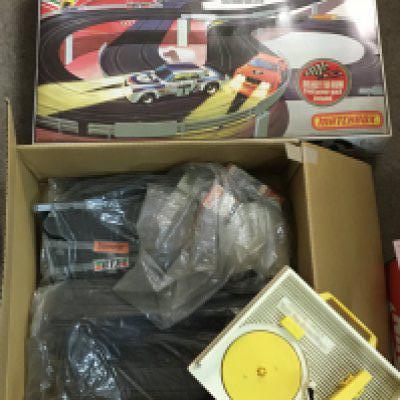 A boxed Matchbox power track 3000 & a Fisher Price Record player. NO RESERVE