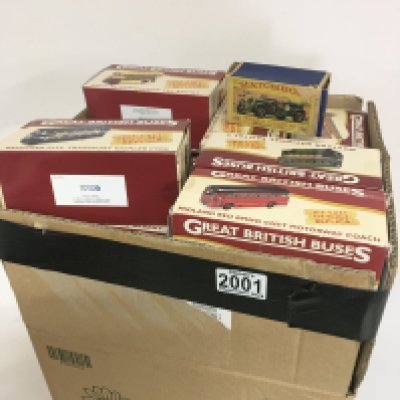 A box containing a collection of Great British Buses die cast models in boxes maker Atlas and a Vintage boxed Matchbox model of Yesteryear a 1929 Bentley.