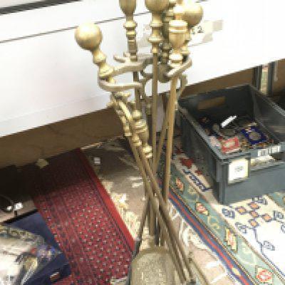 An old brass companion set