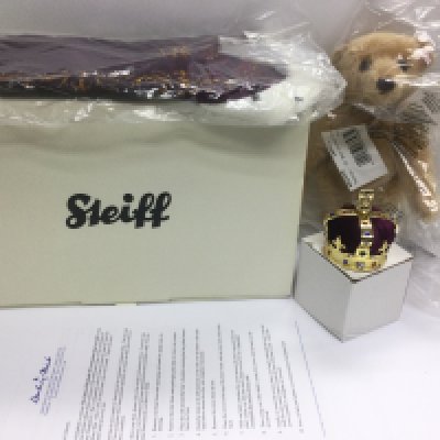 A boxed and as new Queen Elizabeth II Coronation bear by Steiff. Shipping category C.