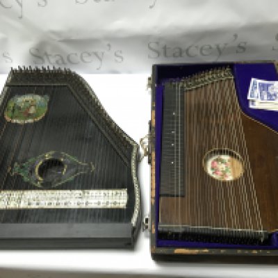 Two autoharps comprising a cased example and a Columbia. Shipping category D.