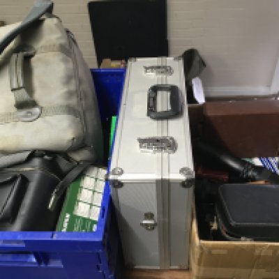 A collection of camera equipment including a Photax 400mm lens, Meopta Admira 8f, 16x50 field 3.5 binoculars etc