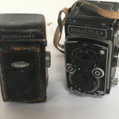 A Vintage Rolleiflex camera and Yashica 44 in a leather case (2);