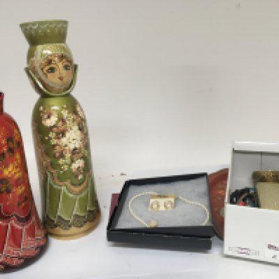 Two Russian painted dolls a tray and a quantity of dress jewellery.